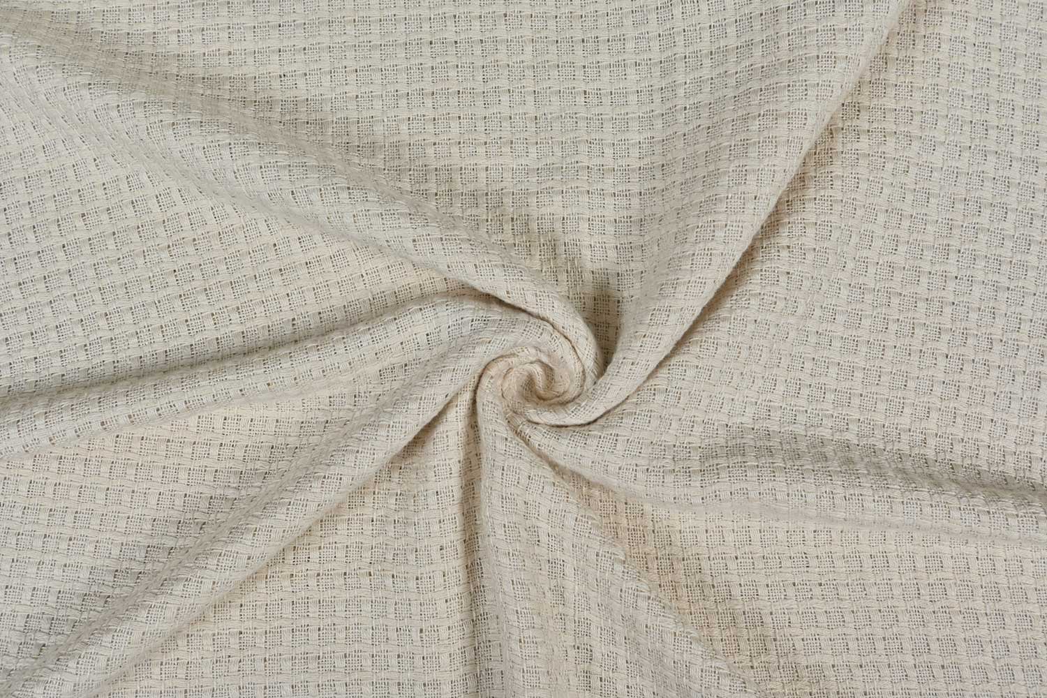 Dense fabric weave blocking sunlight compared to breathable linen material